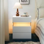 Goldoma LED nightstand 3 drawer dresser with acrylic top and built-in lighting in a modern bedroom