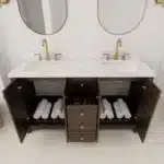 The modern plywood bathroom vanity with two integrated sinks and a white quartz countertop, illuminated by natural