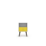 White and yellow nightstand with drawer and open shelf in a bedroom setting