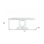 71 inch white marble dining table with pedestal base and chrome accents in a contemporary dining room setting