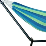 Two person hammock with stand in blue and green stripes on a sunny patio