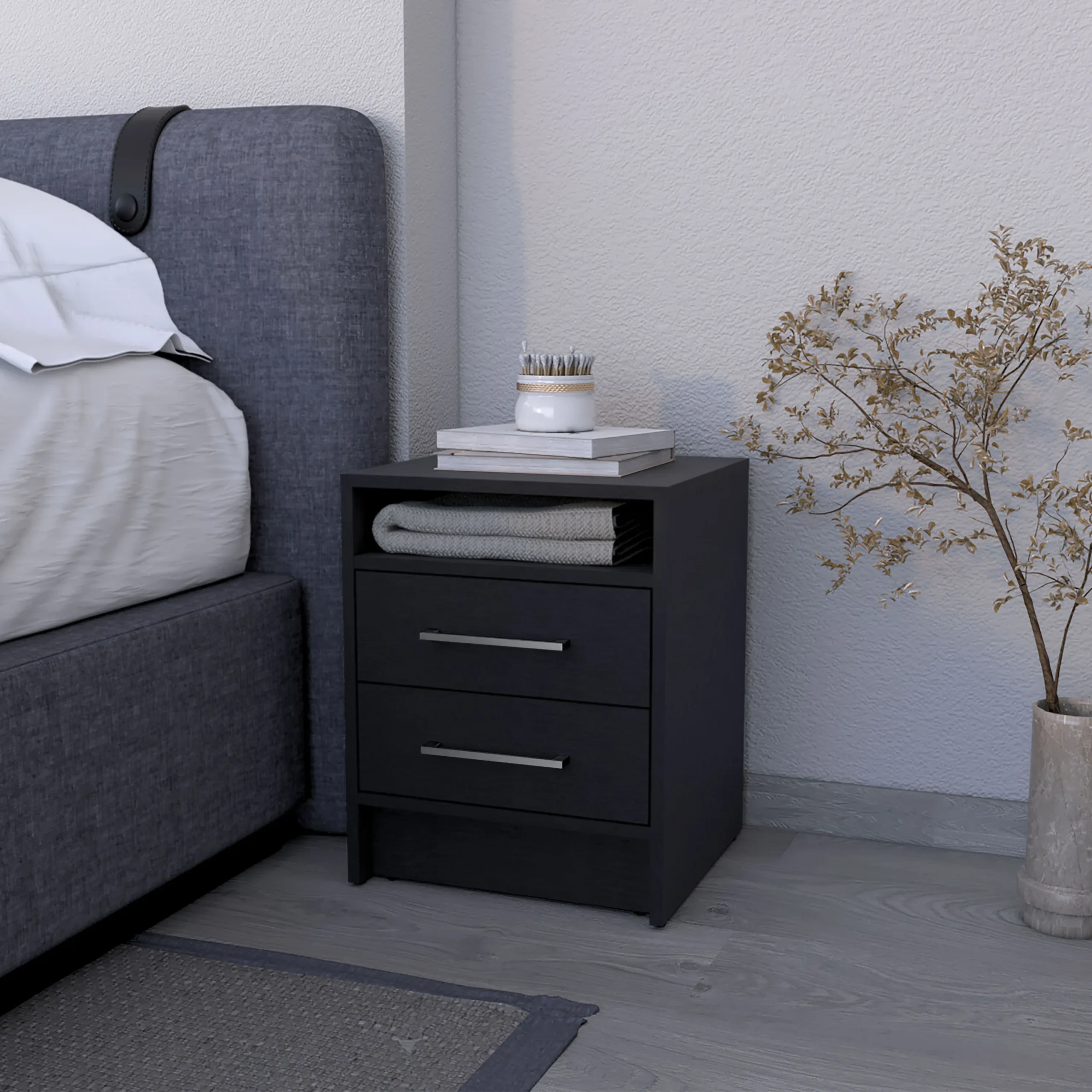 H25163b9a08cf43c5b50291fd09f159b1X.webp Modern black melamine nightstand with two drawers and shelf beside a bed in a bedroom