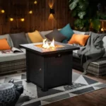 28-inch propane fire pit table with black steel square design on patio