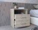 Olienza nightstand with drawers in light gray next to a bed