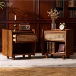 Walnut nightstand with rattan detail featuring a drawer and open shelf in a modern bedroom setting