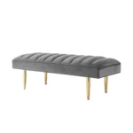 Goldoma 53 inch light gray velvet bench with gold metal frame in a bedroom setting