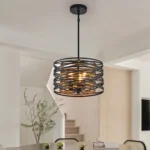 13-inch rustic industrial pendant light with black metal cage and walnut wood accents, hanging over a wooden dining