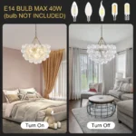 Elegant glass globe chandelier with brass accents in a modern living room