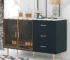 Modern sideboard buffet with marble sticker tabletop and amber-yellow tempered glass doors in a living room
