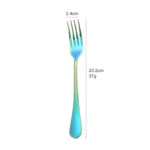 Elegant gold flatware set with fork, knife, and spoon on a white tablecloth