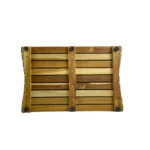 Brown teak bath mat with non-slip slats in a modern bathroom