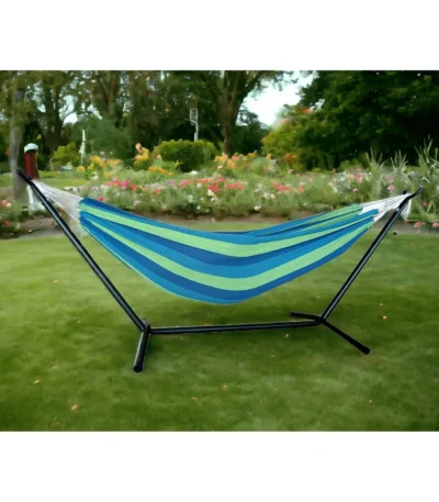 Two person hammock with stand in blue and green stripes on a sunny patio