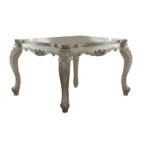 55-inch antiqued white solid wood dining table seating six in a modern dining room