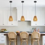 Adjustable height ceiling lamp with hemp rope shade, hanging in a bright room with white walls and natural light.