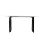 72-inch white and black marble oval dining table with solid wood sled base in a dining room setting