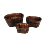 Brown wooden garden planter set with three planters arranged on a patio