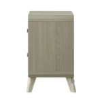 Modern nightstand with USB port and gold capped legs in bedroom setting
