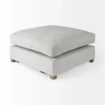 Goldoma light gray fabric cocktail ottoman with brown wood frame in living room