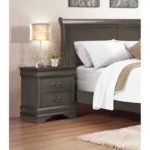 Classic Louis Philippe nightstand with two drawers in stained gray finish displayed in a traditional bedroom setting