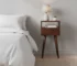 Chestnut brown solid wood nightstand with drawer and open shelf in bedroom