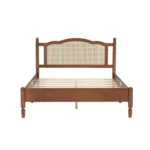 Modern teak finish full size bed with fabric upholstered headboard in a bedroom setting