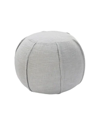 Gray cotton patchwork pouf ottoman with foldable storage bench in a kids bedroom