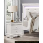 White nightstand with drawers featuring faux alligator embossed drawer fronts