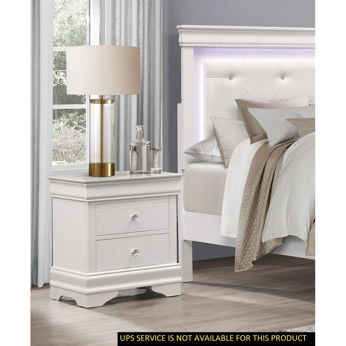 White nightstand with drawers featuring faux alligator embossed drawer fronts