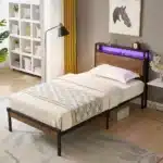 Goldoma Full Size Platform Bed Frame with Wooden Headboard, Footboard, LED Lights & USB Ports – in a cozy room setting