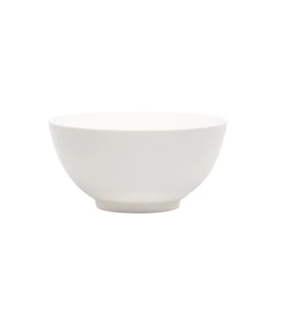 Elegant white porcelain large serving bowl on a wooden table