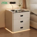 Modern smart nightstand with digital lock, Bluetooth speaker, and wireless charging pad - 3-drawer bedside table in bedroom setting