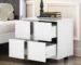 White mirrored nightstand with drawers featuring two drawers and metal feet in a modern bedroom