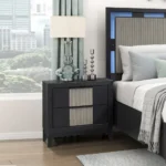 Charcoal gray nightstand with two drawers and reeded front panels in a contemporary solid wood design
