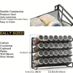 Wall mounted spice rack with 4 layers holding spice jars and oil bottles in a modern kitchen