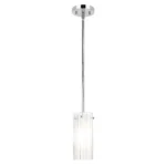 Pendant light turned on, casting soft light over a minimalist dining setting.