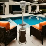 Goldoma mushroom-shaped patio heater glowing with flame, set on a patio with outdoor furniture