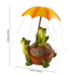 Close-up of solar frog riding turtle statue, textured green resin, umbrella top with solar panel, colorful LED light.