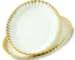 Elegant ceramic dinnerware set with gold rim on a dining table