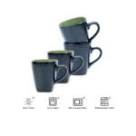 Elegant ceramic dinnerware set with green and black salad bowl, dinner plate, and soup bowl on a wooden table