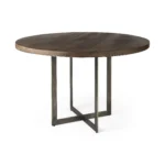 Small dining table with rustic wood top and brown gray metal sled base in a modern living room setting