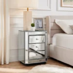 Crushed diamond mirrored nightstand with three drawers in a modern bedroom setting