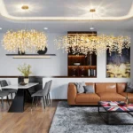 Modern crystal chandelier with gold leaves and clear crystals in a luxury living room