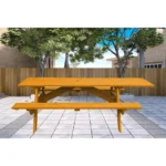 Goldoma natural solid wood outdoor picnic table with umbrella hole on a patio