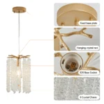 Golden crystal pendant light installed in a living room, casting warm light on a sleek sofa.
