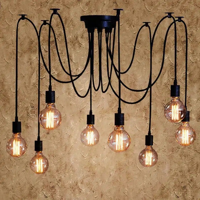 Retro Spider Chandelier Multi-Head Scattered Design Ceiling Pendant Light Adjustable Loft Style Retro spider chandelier with multiple black metal arms and white shades against a dark wall