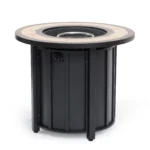 Outdoor gas fire pit column with blue flames on patio