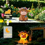 Highland cow solar statue placed on patio with potted plants in background