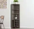 Dark brown wood corner bar cabinet with mirrored back and glass shelves holding wine bottles and glasses