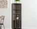 Dark brown wood corner bar cabinet with mirrored back and glass shelves holding wine bottles and glasses