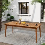 Acacia wood dining table for 6 people on a patio, modern outdoor furniture from Goldoma